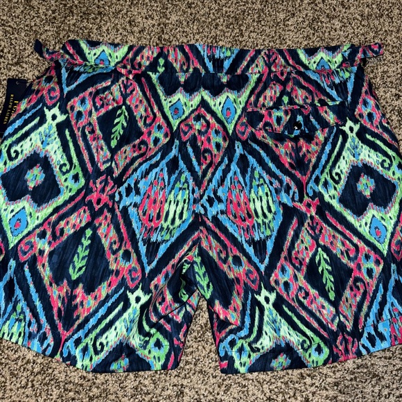 Men’s swim trunks NWT never worn.  Comes with matching travel bag - Picture 2 of 3